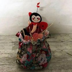 Panier de bonbons et de coccinelles