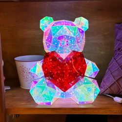 Ursinho de pelúcia com coração vermelho LUZ LED H40 cm.